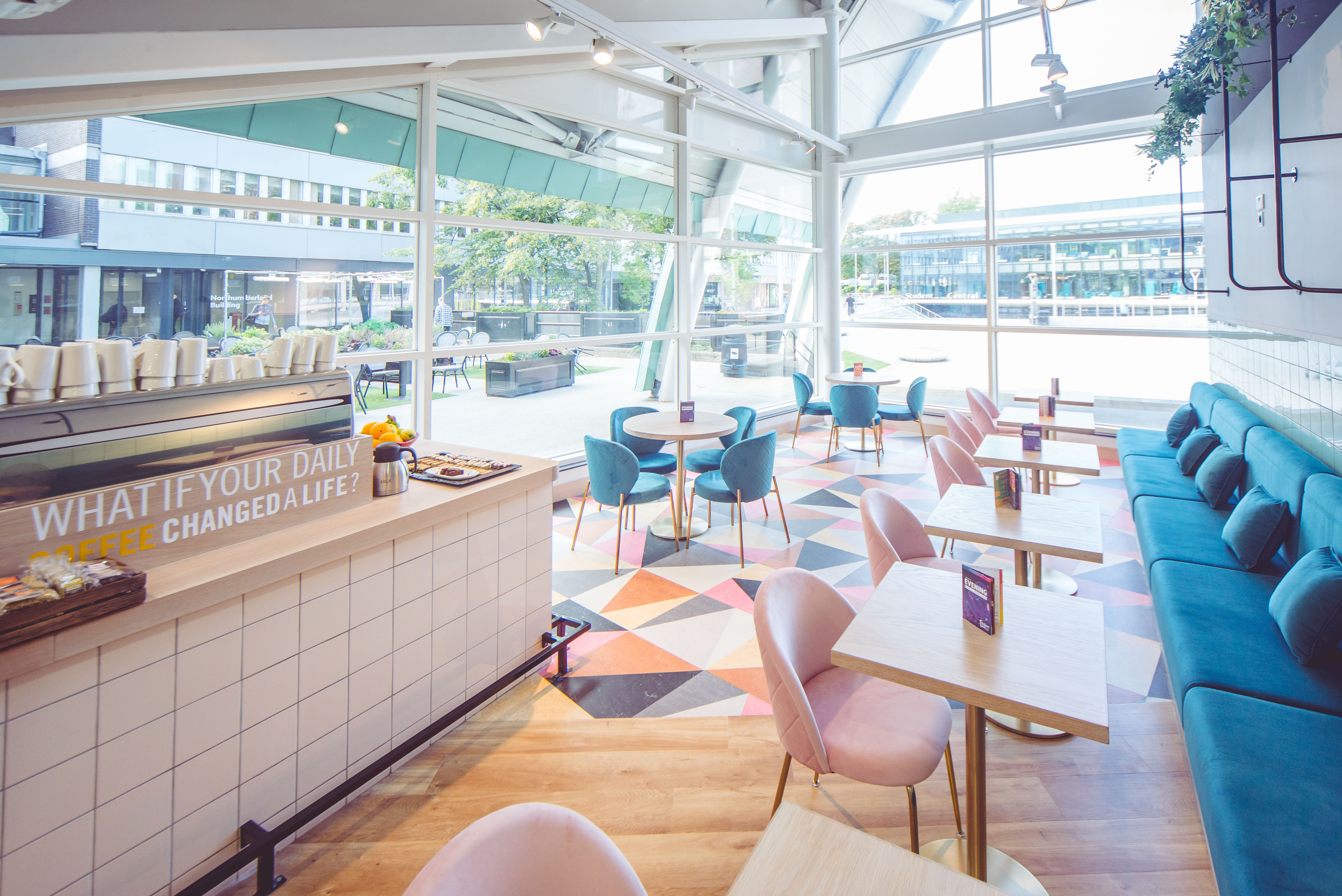 a room filled with furniture and a large window