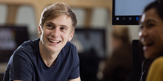 a person smiling for the camera