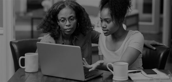 image of mother and daughter on a computer