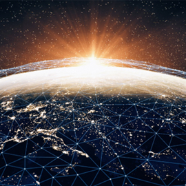 Image of the Earth with a sunrise on the horizon.