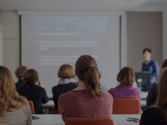 Students at a seminar with a lecturer