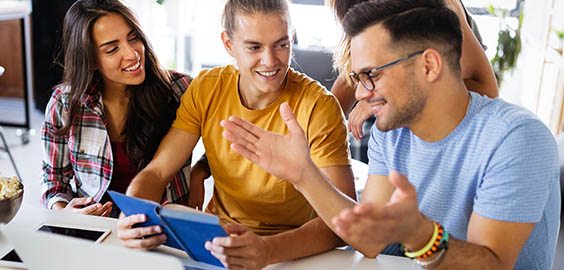 three students working at table