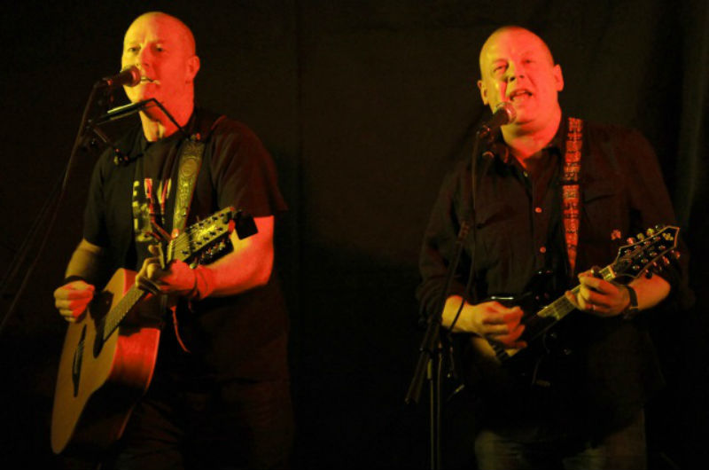 Caption: Tony Machin performing with Micky Oliver