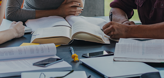 a group of people sitting at a table