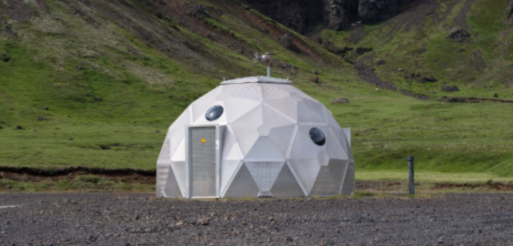 Factory surrounded by fields titled Upstream Image by Paul Dolan
