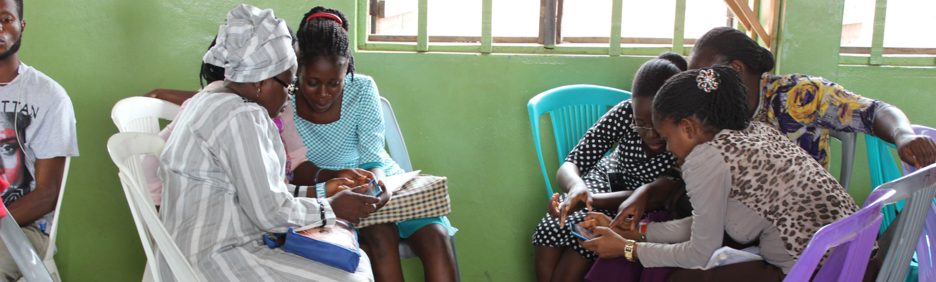 a group of people sitting in a chair