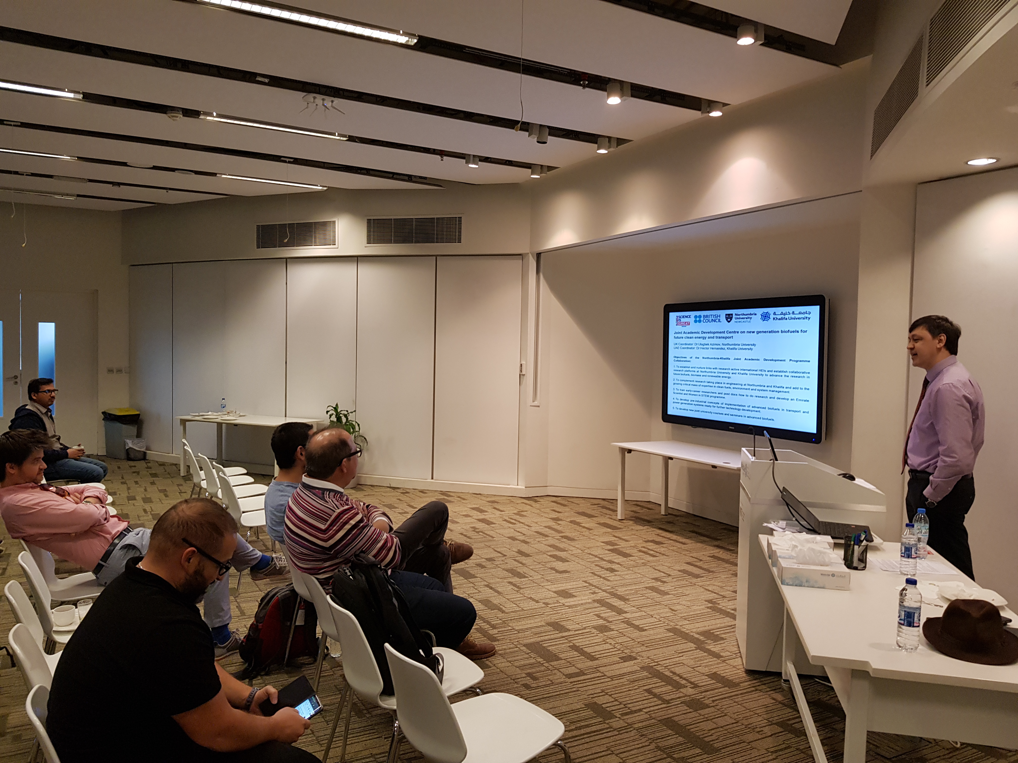 a group of people standing in a room