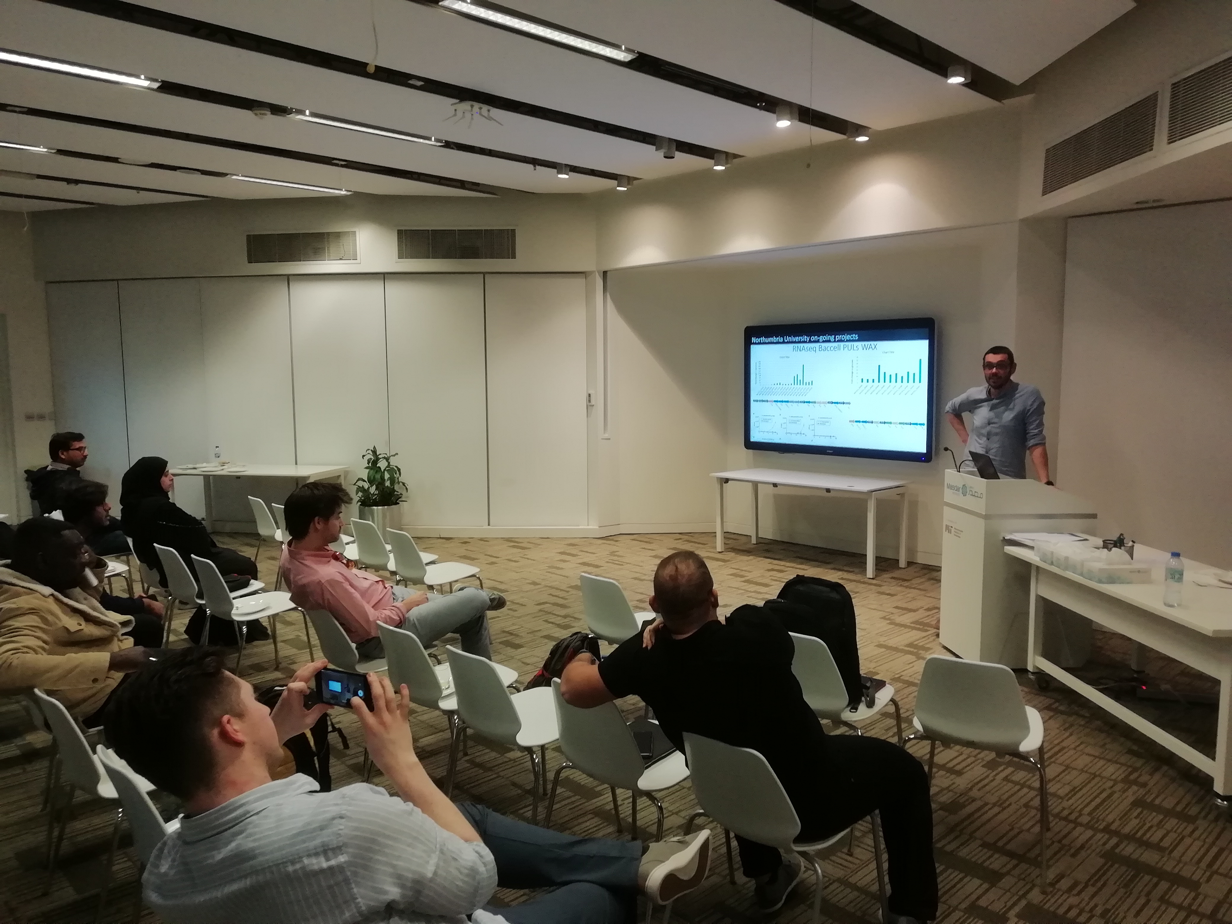 a group of people sitting in a room