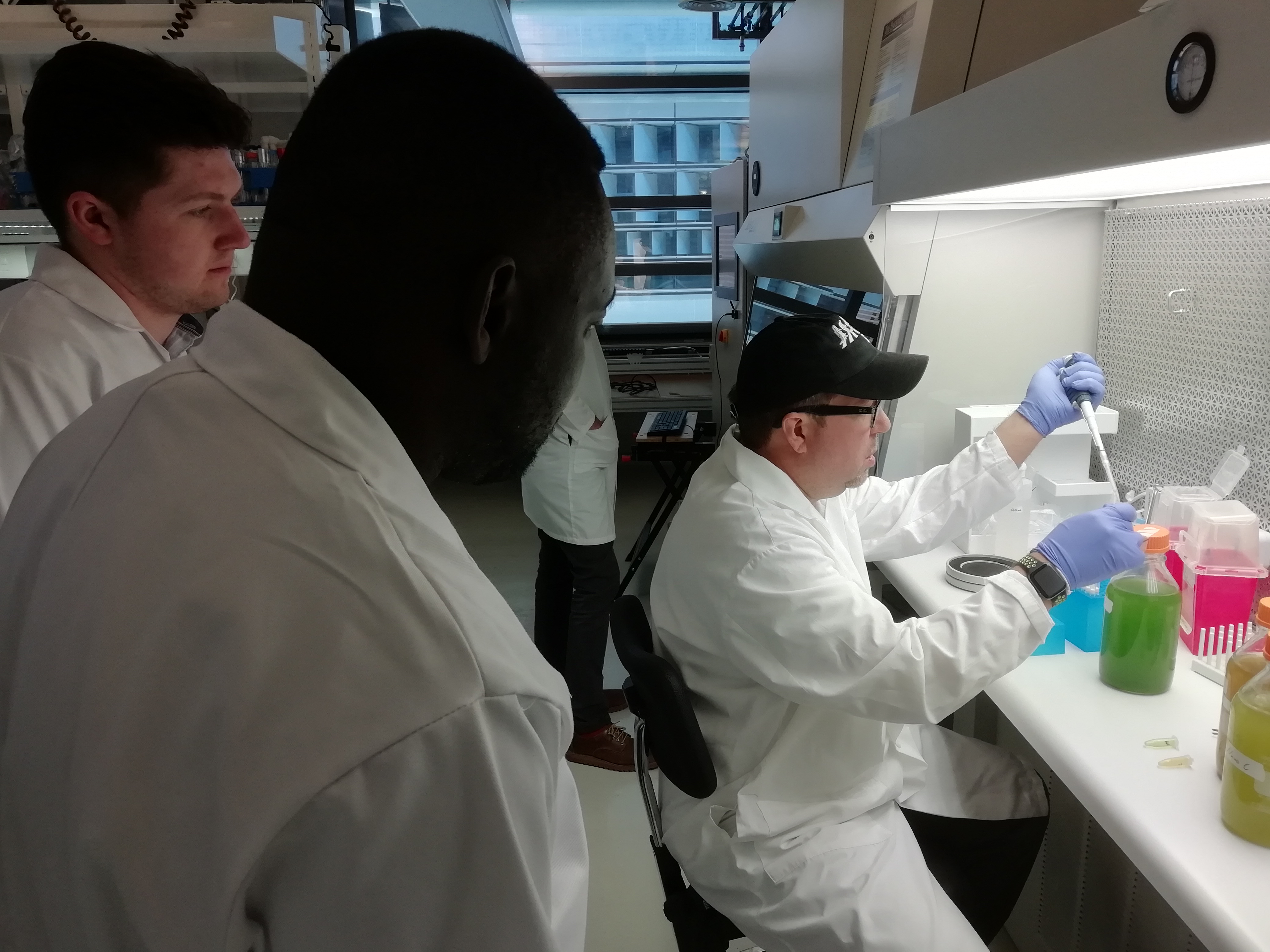 a man standing in a kitchen preparing food