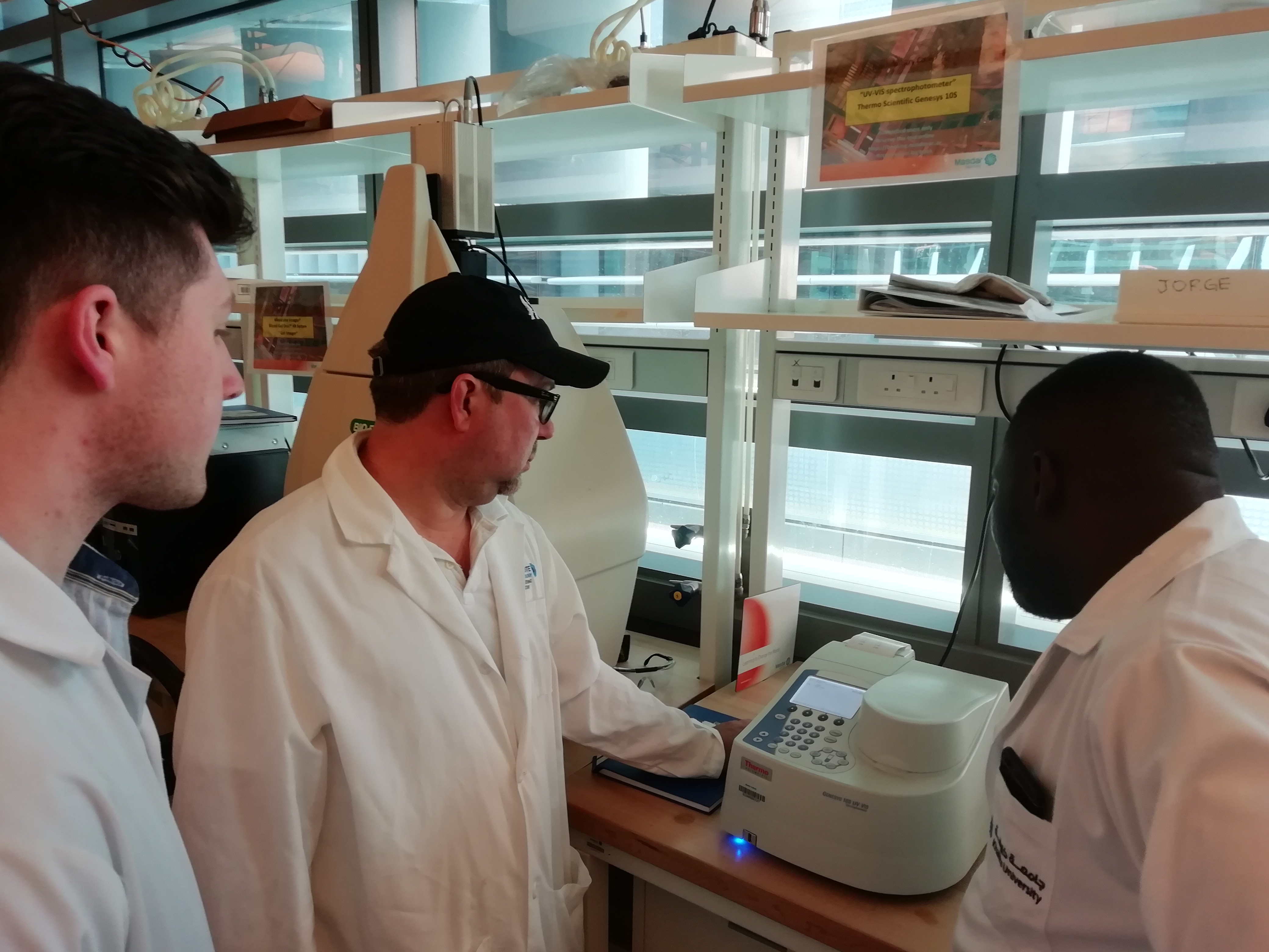 a man standing in front of a window