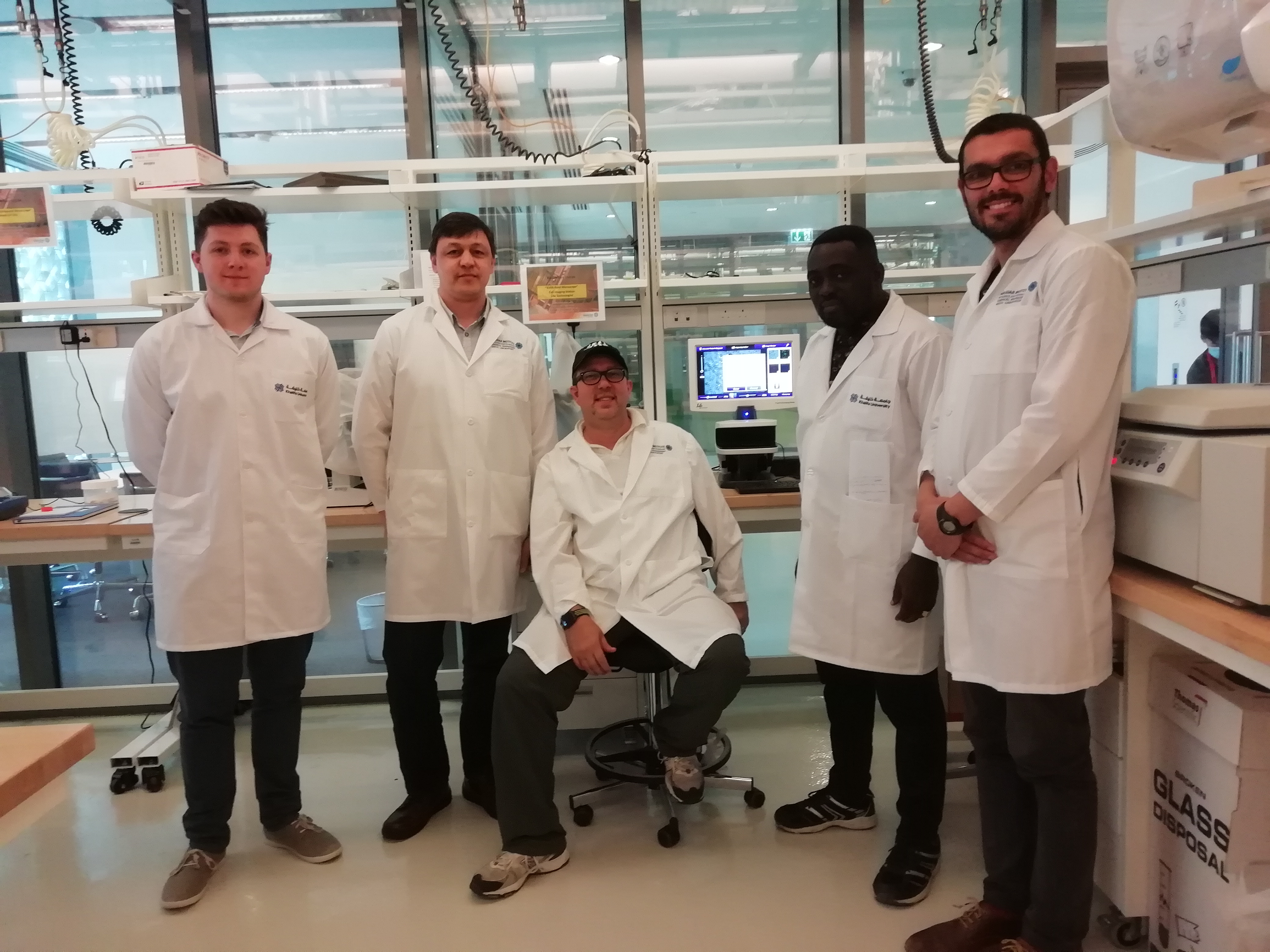 a group of people standing in a room