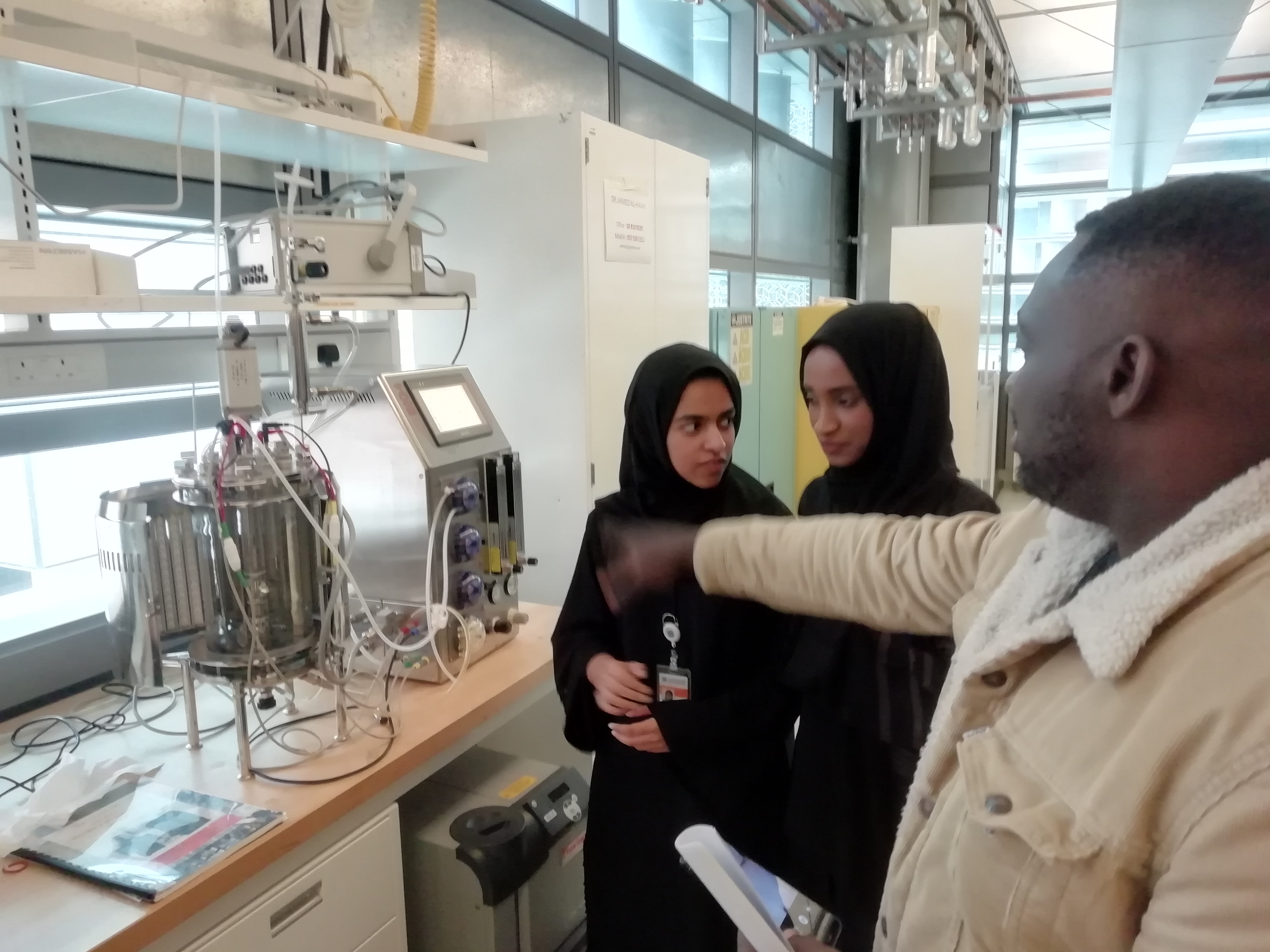 a man and a woman standing in a room