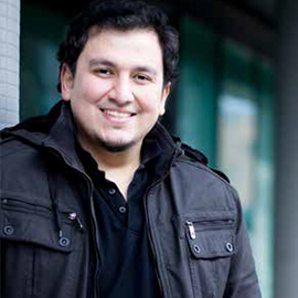 a man smiling for the camera