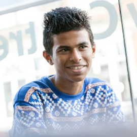 a person smiling for the camera