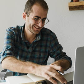 MAN AT LAPTOP