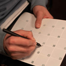 somebody marking a calendar