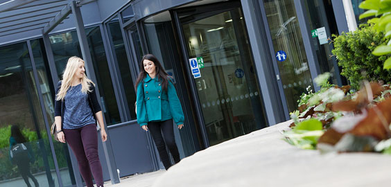 a person standing in front of a building