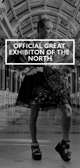 a person riding a skate board on a city street