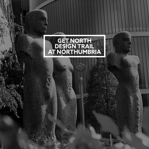a man standing in front of a sign