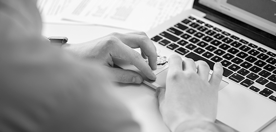 Typing on laptop