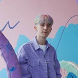 a person standing posing for the camera