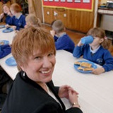 a group of people sitting at a table