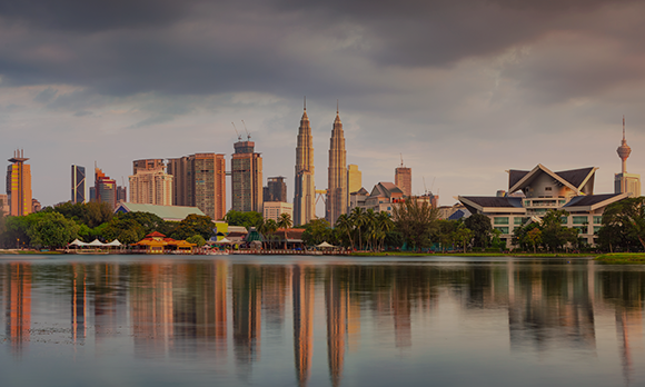 Wide-shot of Kuala Lumpur, Malaysia during sunrise.