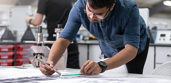 Project Management student using tools.