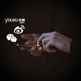 a hand holding a cell phone