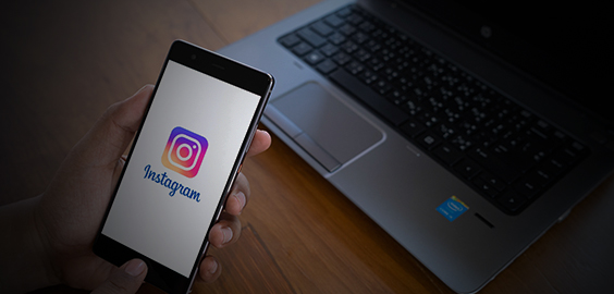 a laptop computer sitting on top of a table