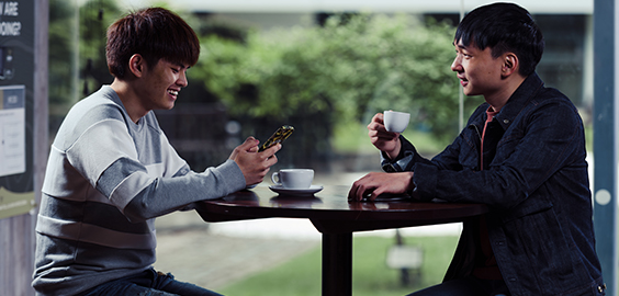 a man talking on a cell phone