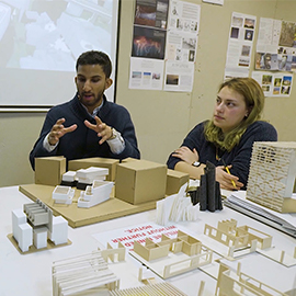 a group of people sitting at a table