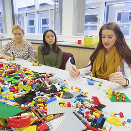 a group of people sitting at a table