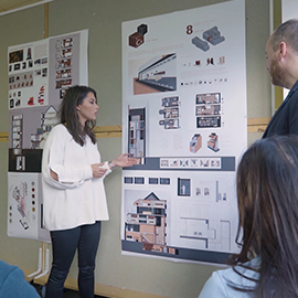 a group of people standing in a room