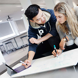 a group of people around each other