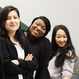 a group of people posing for the camera