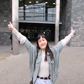 a person standing in front of a building