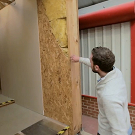 a man standing in front of a door