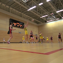 a group of people on a court