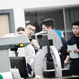 a group of people standing in a room