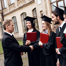 a group of people standing in front of a building