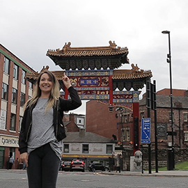a person standing in front of a building