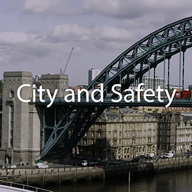 a train crossing a bridge over a body of water