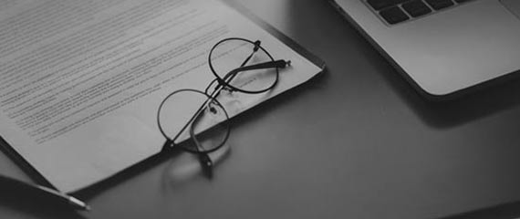 a desk with a computer mouse on a table