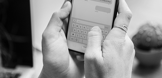 a hand holding a cellphone