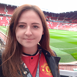 a woman smiling for the camera