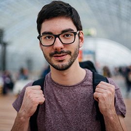 a man talking on a cell phone