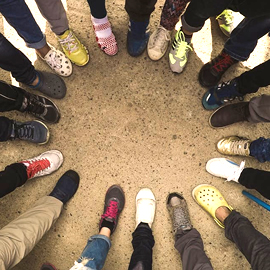a group of shoes on the ground