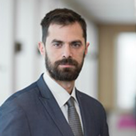 a man wearing a suit and tie