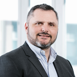 a man wearing a suit and tie